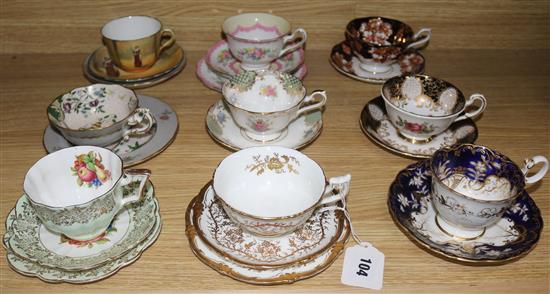 A quantity of mixed tea cups and saucers